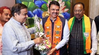 Union minister Nitin Gadkari congratulates Maharashtra deputy chief minister Devendra Fadnavis as Mahayuti sweeps Maharashtra polls, at Gadkari's residence in Nagpur on Saturday (ANI) Union minister Nitin Gadkari congratulates Maharashtra deputy chief minister Devendra Fadnavis as Mahayuti sweeps Maharashtra polls, at Gadkari's residence in Nagpur on Saturday (ANI)