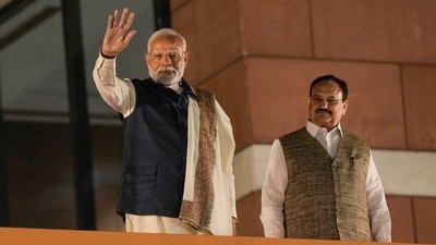 Prime Minister Narendra Modi with Union Minister and BJP president JP Nadda during celebration of the party's victory in the Maharashtra Assembly elections and in several bypolls, at BJP headquarters in New Delhi. (PTI) Prime Minister Narendra Modi with Union Minister and BJP president JP Nadda during celebration of the party's victory in the Maharashtra Assembly elections and in several bypolls, at BJP headquarters in New Delhi. (PTI)