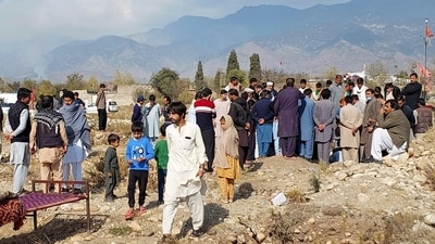 Mourners bury a body of a person killed when gunmen fired on vehicles carrying Shiite Muslims Thursday, after his funeral prayer in Parachinar, main town of Kurram district of Pakistan's northwestern Khyber Pakhtunkhwa province, Friday, Nov. 22, 2024. (AP Photo/Hussain Ali) (AP) Mourners bury a body of a person killed when gunmen fired on vehicles carrying Shiite Muslims Thursday, after his funeral prayer in Parachinar, main town of Kurram district of Pakistan's northwestern Khyber Pakhtunkhwa province, Friday, Nov. 22, 2024. (AP Photo/Hussain Ali) (AP)