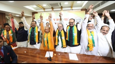 U.P. CM Yogi Adityanath along with deputy CM Keshav Prasad Maurya and BJP state presient Bhupendra Singh Chaudhry and others celebrate at the BJP party office after BJP won in UP bypolls in Lucknow (HT Photo) U.P. CM Yogi Adityanath along with deputy CM Keshav Prasad Maurya and BJP state presient Bhupendra Singh Chaudhry and others celebrate at the BJP party office after BJP won in UP bypolls in Lucknow (HT Photo)