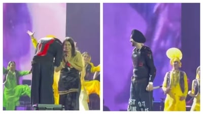 Diljit Dosanjh meets a fan on stage for a special moment. Diljit Dosanjh meets a fan on stage for a special moment.