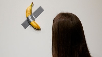 Italian visual artist Maurizio Cattelan's duct-taped Banana titled Comedian. (AFP)