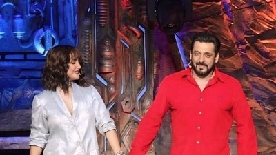 Hina Khan and Salman Khan on the Bigg Boss 18 stage. Hina Khan and Salman Khan on the Bigg Boss 18 stage.