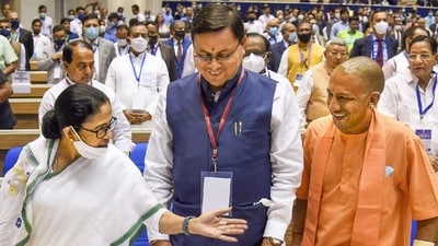 West Bengal chief minister Mamata Banerjee, Uttarakhand CM Pushkar Singh Dhami and his UP counterpart Yogi Adityanath. West Bengal chief minister Mamata Banerjee, Uttarakhand CM Pushkar Singh Dhami and his UP counterpart Yogi Adityanath.