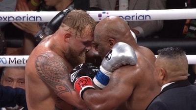 Following Tyson's initial outburst, the seasoned fighter seemed to tire out quickly, letting Paul seize the battle. (X) Following Tyson's initial outburst, the seasoned fighter seemed to tire out quickly, letting Paul seize the battle. (X)