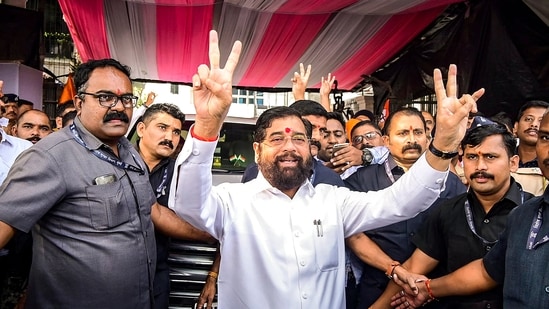 Thane, Palghar election results live:  Maharashtra Chief Minister Eknath Shinde, with supporters, flashes victory signs as the BJP-led Mahayuti alliance leads amid the counting of votes for the Maharashtra Assembly elections in Thane.