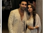 The couple twinned in white. 