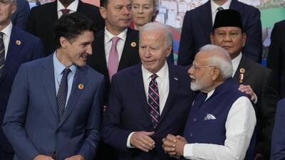 Canada's Prime Minister Justin Trudeau, from left, US President Joe Biden and India's Prime Minister Narendra Modi gather for the G20 Summit world leaders' group photo, in Rio de Janeiro, on November 19 (AP) Canada's Prime Minister Justin Trudeau, from left, US President Joe Biden and India's Prime Minister Narendra Modi gather for the G20 Summit world leaders' group photo, in Rio de Janeiro, on November 19 (AP)