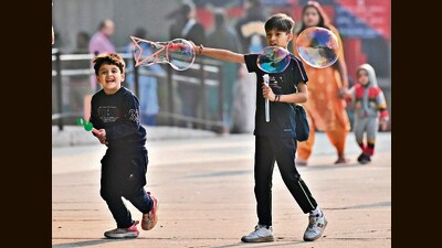 Children frolicking amid sunny weather at the Sector 17 Plaza in Chandigarh. (Ravi Kumar/HT) Children frolicking amid sunny weather at the Sector 17 Plaza in Chandigarh. (Ravi Kumar/HT)