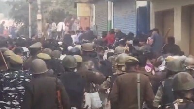 Police use tear gas and lathicharge to control crowd during mosque survey in Uttar Pradesh. (PTI) Police use tear gas and lathicharge to control crowd during mosque survey in Uttar Pradesh. (PTI)