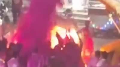 The fire occurred when women performing an 'aarti' for Shivaji Patil at Mahgaon were caught in a blaze caused by a large amount of gulal falling from a crane onto their 'aarti' plates. (HT Marathi) The fire occurred when women performing an 'aarti' for Shivaji Patil at Mahgaon were caught in a blaze caused by a large amount of gulal falling from a crane onto their 'aarti' plates. (HT Marathi)