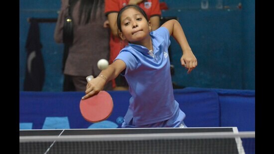 A player in action during the district table tennis championship at New Table Tennis Hall in Ludhiana on Sunday. (Manish/HT)