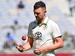 Australia's Josh Hazlewood prepares to bowl during day three of the first Test cricket match between Australia and India Australia's Josh Hazlewood prepares to bowl during day three of the first Test cricket match between Australia and India