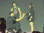 Diljit Dosanjh stood near the couple as the man proposed to his girlfriend. Diljit Dosanjh stood near the couple as the man proposed to his girlfriend.