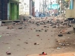 Sambhal: Footwears and brick bats lying on a road after violence erupted during the second survey of the Jama Masjid. Sambhal: Footwears and brick bats lying on a road after violence erupted during the second survey of the Jama Masjid.