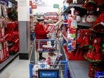 FILE PHOTO: Shoppers crowd a Walmart store ahead of the Thanksgiving holiday in Chicago, Illinois, U.S. November 27, 2019.