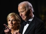 US President Joe Biden gets emotional as he speaks, alongside US First Lady Jill Biden, during a dinner to thank longtime supporters on the South Lawn of the White House in Washington, DC, on November 21, 2024. US President Joe Biden gets emotional as he speaks, alongside US First Lady Jill Biden, during a dinner to thank longtime supporters on the South Lawn of the White House in Washington, DC, on November 21, 2024.