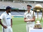 Jasprit Bumrah (L) in conversation with Pat Cummins Jasprit Bumrah (L) in conversation with Pat Cummins