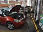 Vehicles are seen filling CNG gas at Thane CNG pump in Thane, near Mumbai, on November 23, 2024. 