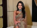 Radhika Merchant's sequin saree stood out with its stunning interplay of textures. Radhika Merchant's sequin saree stood out with its stunning interplay of textures.