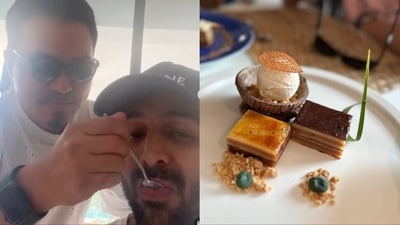 A video showed several of Kartik Aaryan's friends feeding him pieces of cake as he sat at a table. 