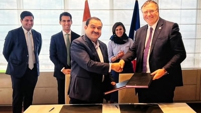 Gautam Adani, chairman of Adani Group (left) with Patrick Pouyanné, chairman and CEO of TotalEnergies. (File Photo) Gautam Adani, chairman of Adani Group (left) with Patrick Pouyanné, chairman and CEO of TotalEnergies. (File Photo)