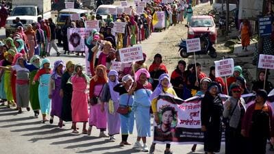 Demonstrators hold placards as they take part in a protest rally against recent killings and reimposition of the Armed Forces Special Powers Act (AFSPA) in six police station areas of Manipur. (REUTERS) Demonstrators hold placards as they take part in a protest rally against recent killings and reimposition of the Armed Forces Special Powers Act (AFSPA) in six police station areas of Manipur. (REUTERS)