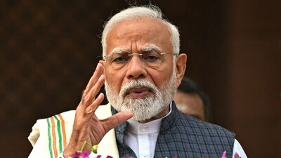 Prime Minister Narendra Modi addresses the media upon his arrival on the first day of the winter session of the parliament in New Delhi on November 25. (Photo by Sajjad HUSSAIN / AFP) (AFP) Prime Minister Narendra Modi addresses the media upon his arrival on the first day of the winter session of the parliament in New Delhi on November 25. (Photo by Sajjad HUSSAIN / AFP) (AFP)
