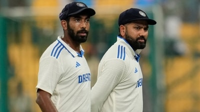India's captain Rohit Sharma, right, and Jasprit Bumrah leave the field (AP) India's captain Rohit Sharma, right, and Jasprit Bumrah leave the field (AP)