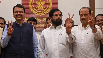 Maharashtra Chief Minister Eknath Shinde, Deputy Chief Minister Devendra Fadnavis, and Ajit Pawar celebrated their victory in the Maharashtra Assembly elections in Mumbai on November 23. (Photo by Raju Shinde/HT Photo) (Hindustan Times) Maharashtra Chief Minister Eknath Shinde, Deputy Chief Minister Devendra Fadnavis, and Ajit Pawar celebrated their victory in the Maharashtra Assembly elections in Mumbai on November 23. (Photo by Raju Shinde/HT Photo) (Hindustan Times)
