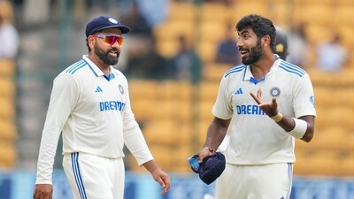Jasprit Bumrah (R) has made it slightly difficult for the returning Rohit Sharma (PTI) Jasprit Bumrah (R) has made it slightly difficult for the returning Rohit Sharma (PTI)