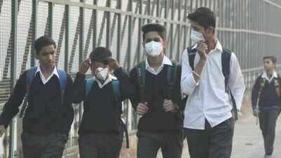 A file photo of children walking to school wearing face masks to protect themselves from air pollution in Delhi. (Raj K Raj/HT File Photo) A file photo of children walking to school wearing face masks to protect themselves from air pollution in Delhi. (Raj K Raj/HT File Photo)