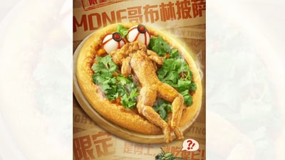 Pizza Hut China has introduced a pizza that comes with a whole bullfrog on top Pizza Hut China has introduced a pizza that comes with a whole bullfrog on top
