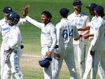 Indian squad celebrate the victory during Day 4 of the first Test match against Australia, at Perth Stadium, in Perth on Monday.