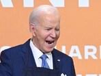 Joe Biden declares ‘I’ve been fired’ while sneaking bites from ‘friendsgiving’ military buffet (Photo by SAUL LOEB / AFP) Joe Biden declares ‘I’ve been fired’ while sneaking bites from ‘friendsgiving’ military buffet (Photo by SAUL LOEB / AFP)