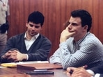 Erik Menendez (R) and brother Lyle listen to court proceedings during a May 17, 1991, appearance in the case of the shotgun murder of their wealthy parents in August 1989.