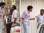 The image shows an influencer asking random Indian men to marry him. 