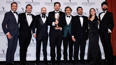 Jack Ades Cohen, Jaime Jimenez Rion and others pose with the Kids: Factual &amp; Entertainment award for La Vida Secreta de tu Mente (The secret life of your mind). 