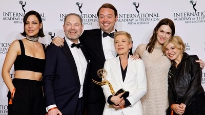 Isabel Kleefeld and Friedrich Oetker pose with the TV Movie/Mini-Series award for Liebes Kind [Dear Child] at the 52nd International Emmy Awards. 