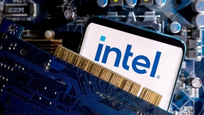 A smartphone with a displayed Intel logo is placed on a computer motherboard in this illustration taken March 6, 2023. (Dado Ruvic/Reuters)