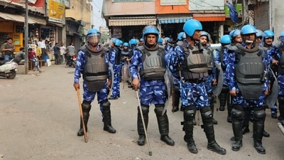 RAF personnel guard in a violence-hit area a day after clashes and stone pelting incidents over the survey of the Jama mosque, in Sambhal. (PTI Photo) (PTI) RAF personnel guard in a violence-hit area a day after clashes and stone pelting incidents over the survey of the Jama mosque, in Sambhal. (PTI Photo) (PTI)