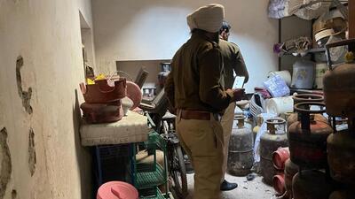 Police at the spot where a cylinder exploded at the busy Kamla market in Mohali village on Tuesday. (HT Photo) Police at the spot where a cylinder exploded at the busy Kamla market in Mohali village on Tuesday. (HT Photo)