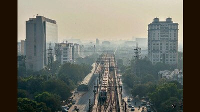 The sun sets over the Millennium City Centre Metro station in Gurugram on Tuesday evening. (Parveen Kumar/HT PHOTO) The sun sets over the Millennium City Centre Metro station in Gurugram on Tuesday evening. (Parveen Kumar/HT PHOTO)