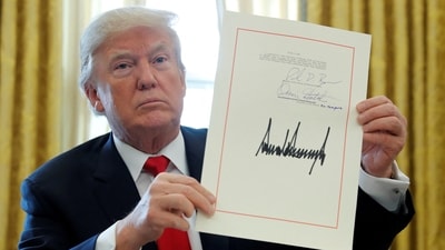 Donald Trump on Monday pledged tariffs on the United States' three largest trading partners - Canada, Mexico and China. (REUTERS)