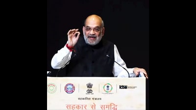 Union Home and Cooperation Minister Amit Shah speaks at the diamond jubilee celebrations of National Federation of State Cooperative Banks Limited 'NAFSCOB', in New Delhi, Tuesday. (PTI) Union Home and Cooperation Minister Amit Shah speaks at the diamond jubilee celebrations of National Federation of State Cooperative Banks Limited 'NAFSCOB', in New Delhi, Tuesday. (PTI)