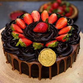 Vanilla Beans' popular decadent chocolate cake with strawberries Vanilla Beans' popular decadent chocolate cake with strawberries