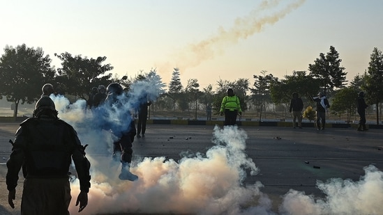 Police in Islamabad resorted to tear gas to disperse the protesting supporters of ex-Pakistan PM Imran Khan, who are demanding his release from jail.&nbsp;(AFP)