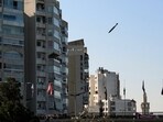 A bomb dropped from an Israeli jet prepares to hit a building in Tayouneh, Beirut, Lebanon. A bomb dropped from an Israeli jet prepares to hit a building in Tayouneh, Beirut, Lebanon.