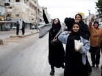 Women welcome the people coming back to Tyre, after a ceasefire between Israel and Hezbollah.