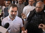 Lok Sabha LoP Rahul Gandhi with Congress President Mallikarjun Kharge speaks to the media at Parliament on the third day of the Winter Session, in New Delhi on Wednesday. 